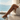 applying vegan DHA self-tanner safely at home for a natural island glow