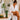 Woman applying CBD self-tanner to leg with tropical CBD skincare products on bathroom counter