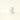 White jar of Monoi de Tahiti body butter on a light beige background